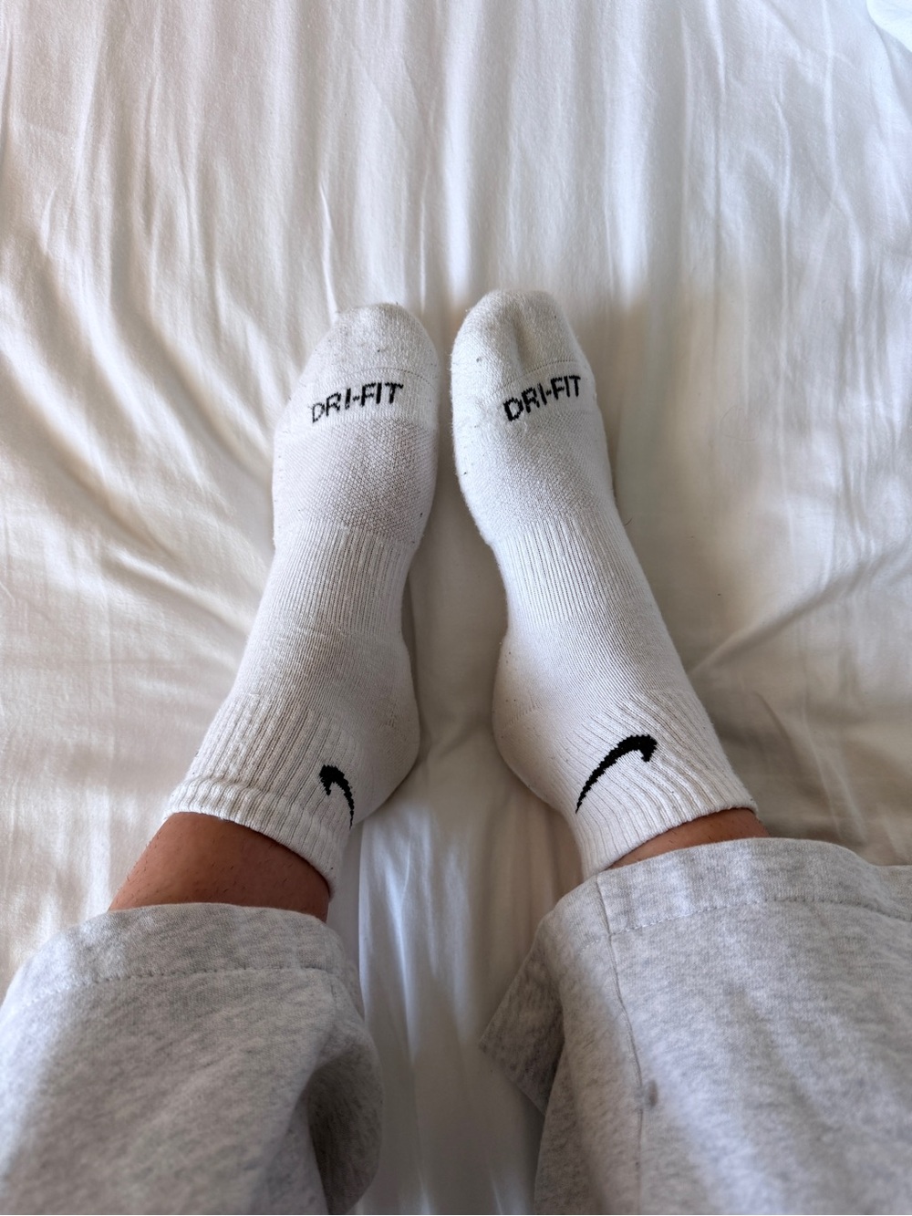 Nike White Athletic Dri-FIT Crew Socks with Black Swoosh